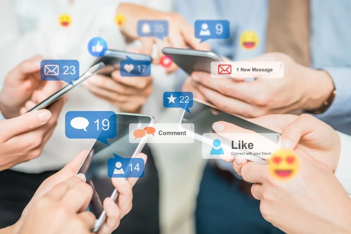group of people checking social media