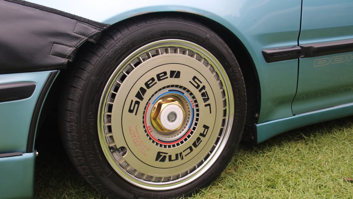 closeup image of a wheel on display at the 11th Annual Japanese Classic Car Show