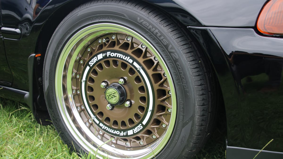 closeup image of a wheel on display at the 11th Annual Japanese Classic Car Show