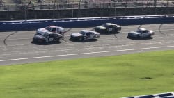NASCAR Xfinity cars racing at the Auto Club Speedway