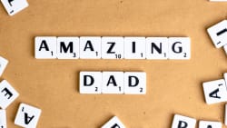 amazing dad, spelled out using scrabble pieces.