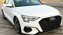 a white 2022 Audi A3, seen from an angle from the front.