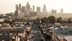 a residential street seemingly heading to downtown Los Angeles