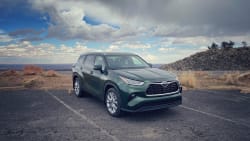 A 2023 Toyota Highlander Limited, as seen from the front with a bit of the right side visible.