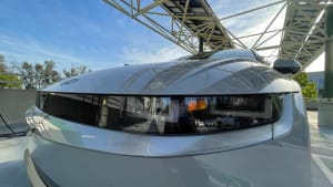 The 2022 Hyundai Ioniq 5, seen from the front with a closeup of the left front headlight.