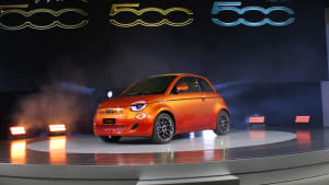 image of an orange Fiat 500 on display at the 2022 Los Angeles Auto Show