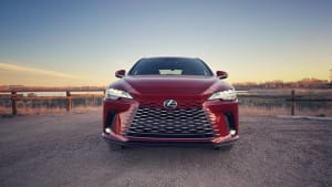 image of the 2023 Lexus RX350h as seen from the front, with a sunrise in the background