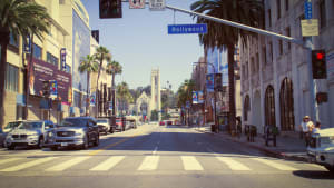 image from inside a car sitting at a red light ready to cross Hollywood Boulevard in Los Angeles