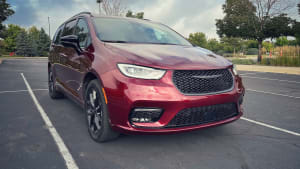 a red 2023 Chrysler Pacifica parked in a parking spot