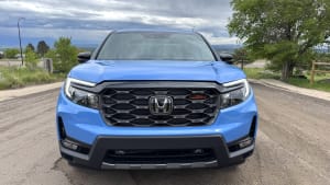a blue Honda Ridgeline Trailblazer seen from the front