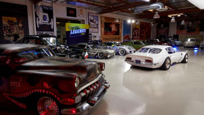 showroom floor full of the life-size Hot Wheels Legends vehicles