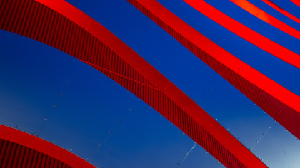 an artsy close-up photo of the exterior of The Petersen Museum with red and blue lines.