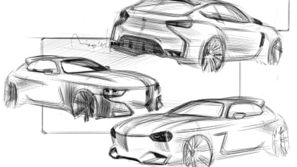 multiple cars sketched out on a paper
