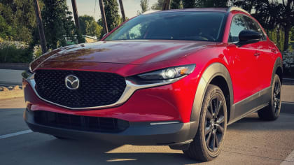 front and side view of a red 2023 Mazda CX-30