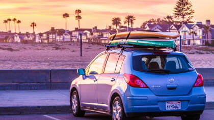 image of a car at the beach
