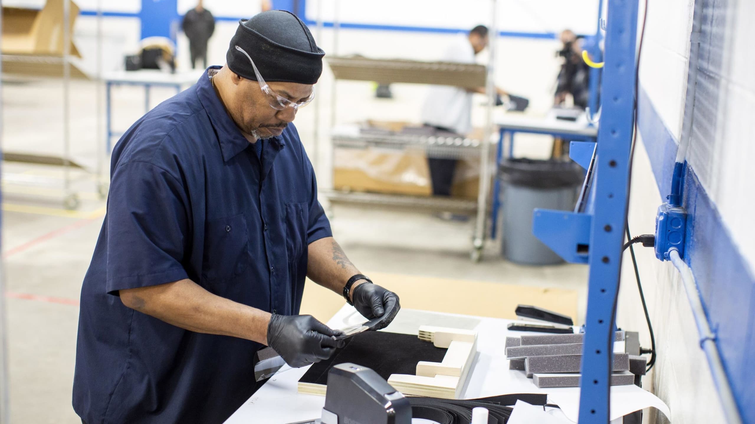 Ford factory worker working on new medical equipment