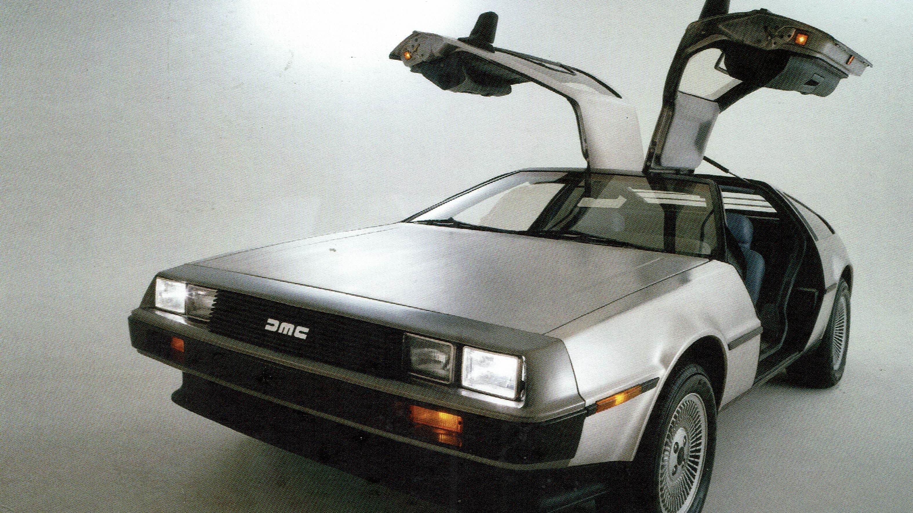 grey DMC with gullwing doors fully open