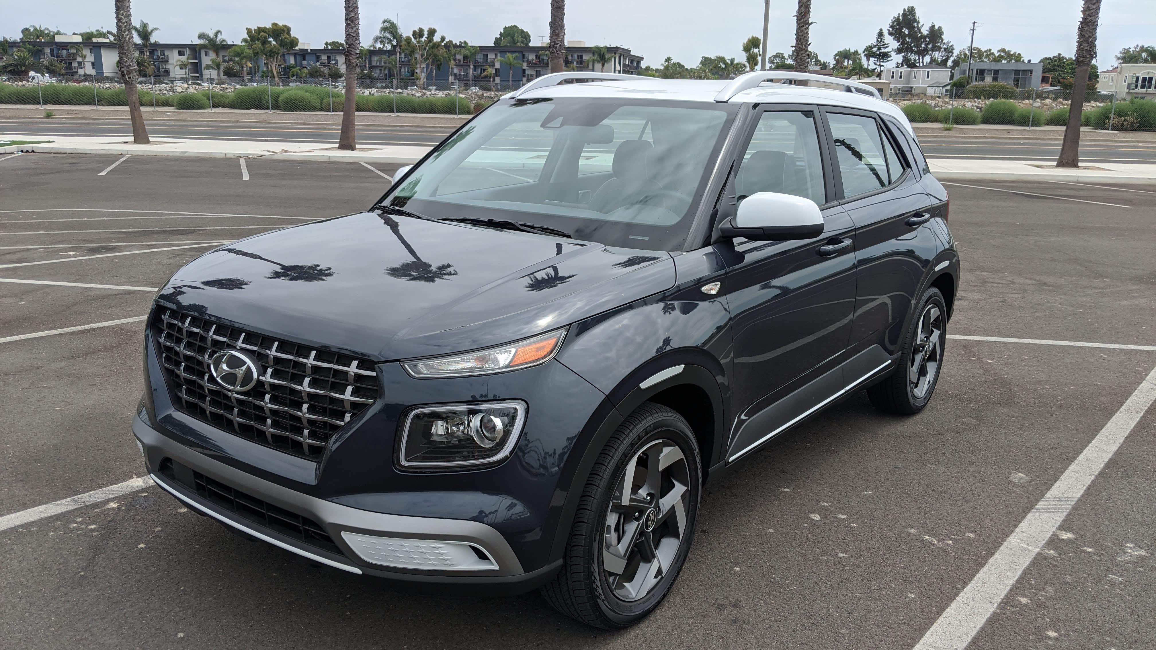 a dark blue 2021 Hyundai Venue Denim, parked in a parking log in Seal Beach, California