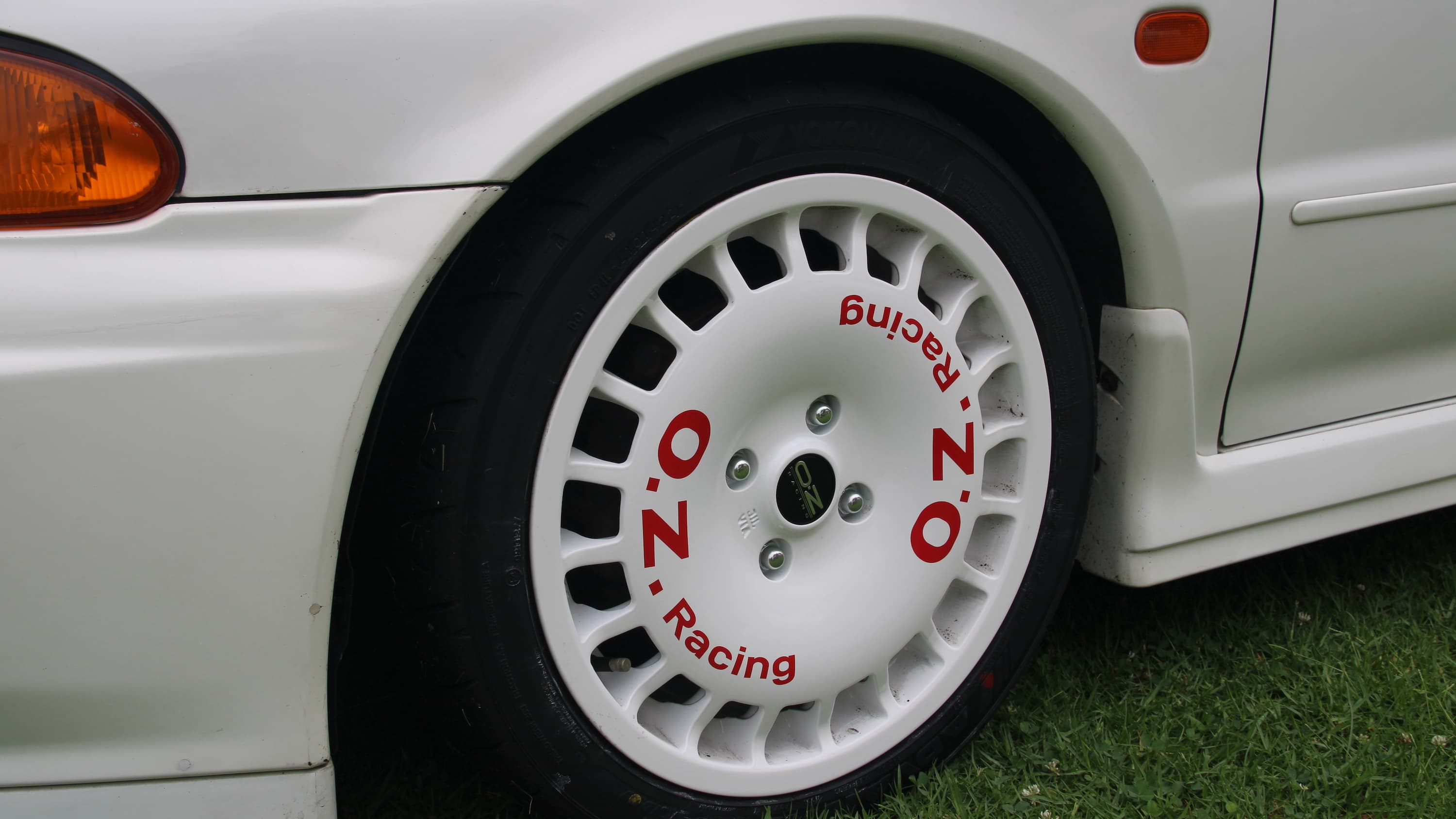 closeup image of a wheel on display at the 11th Annual Japanese Classic Car Show