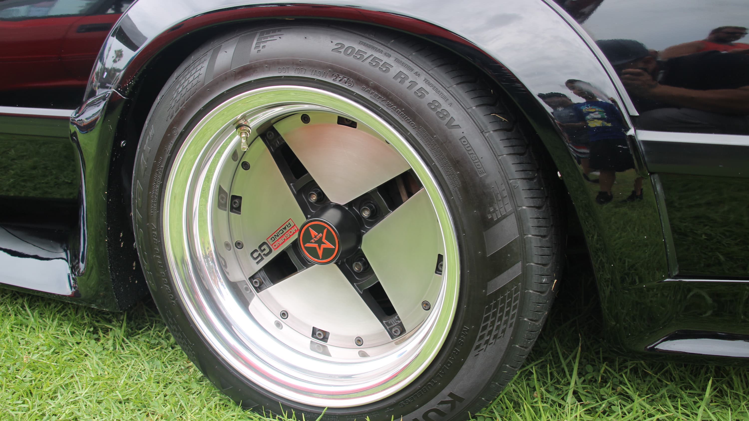 closeup image of a wheel on display at the 11th Annual Japanese Classic Car Show