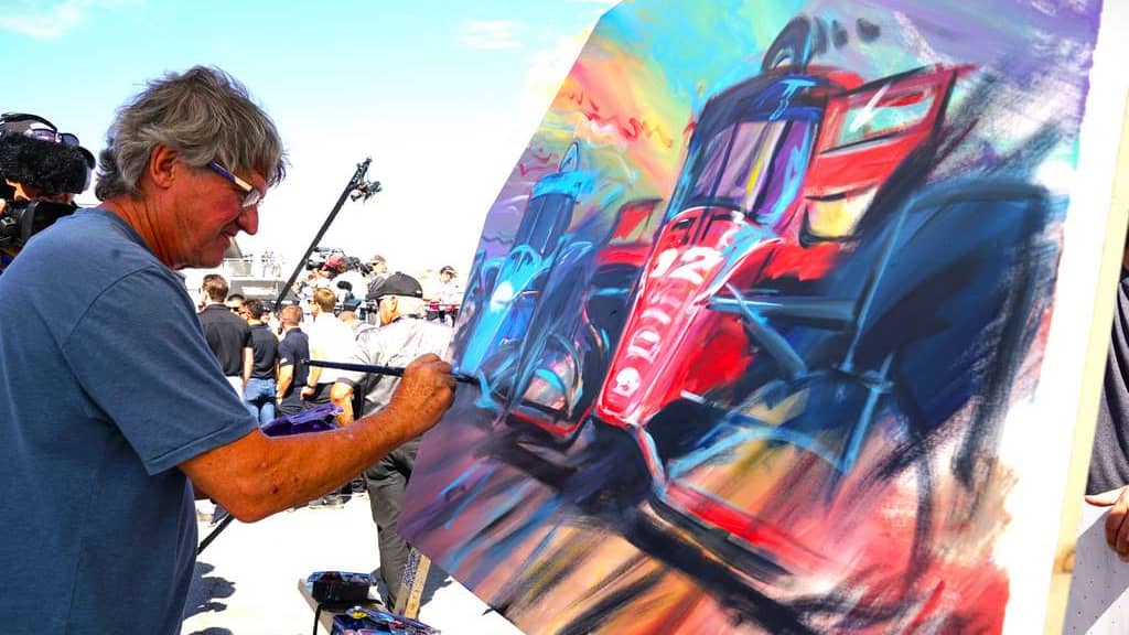 Motionsports Artist Bill Patterson performs his usual victory printing in victory lane