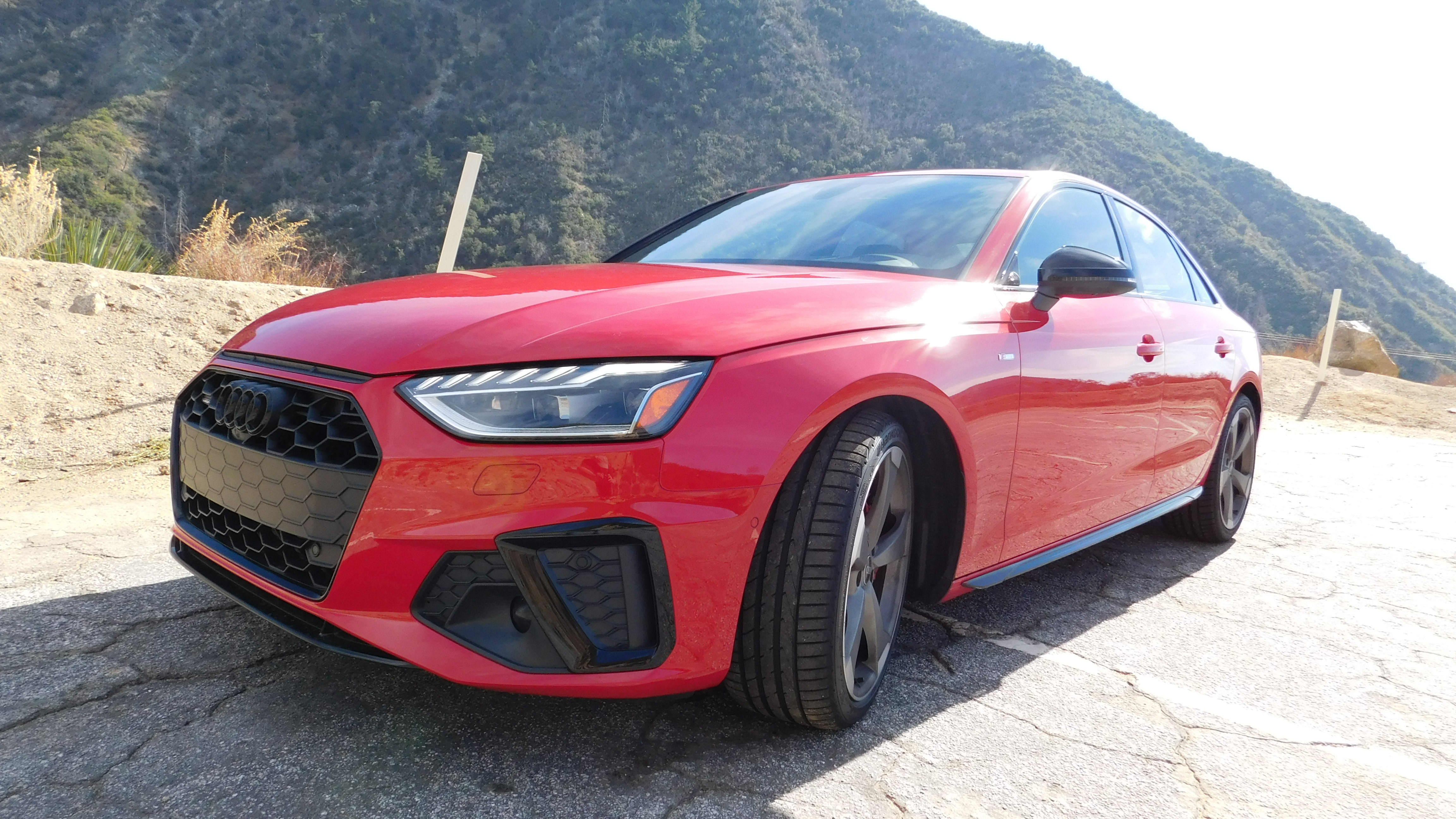 The red 2022 Audi A4 as seen from the front left side.