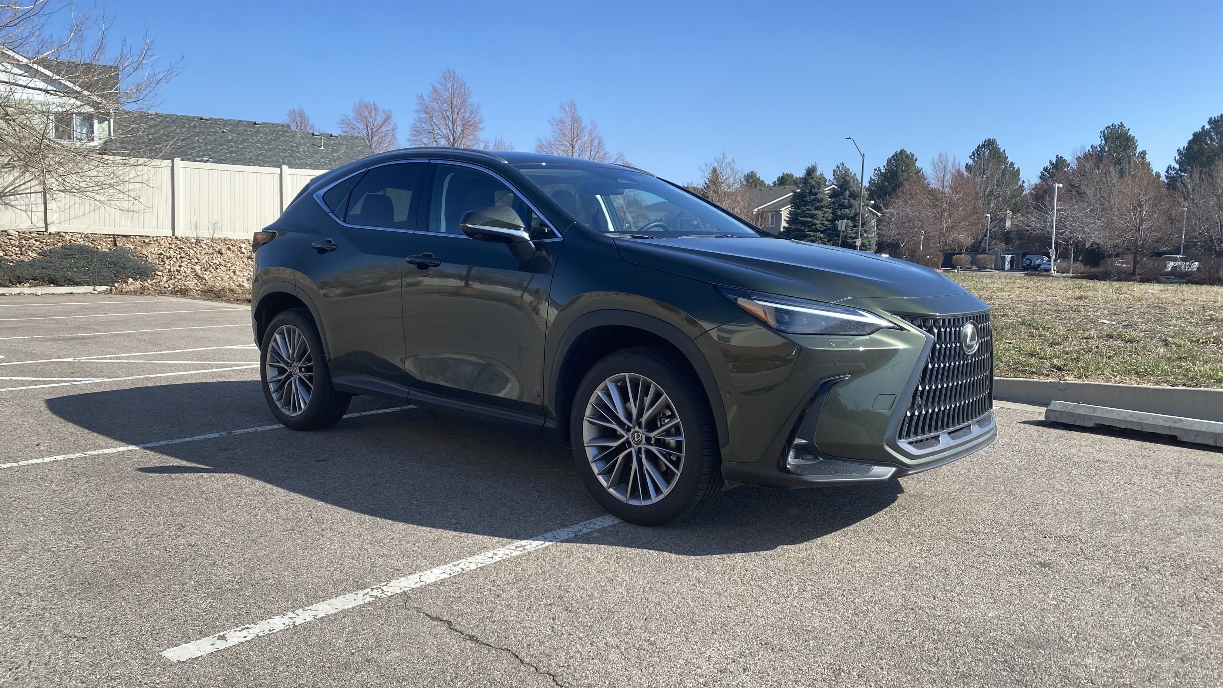 image of the exterior of a 2023 Lexus NX 350h Luxury wearing the Nori Green Pearl coat