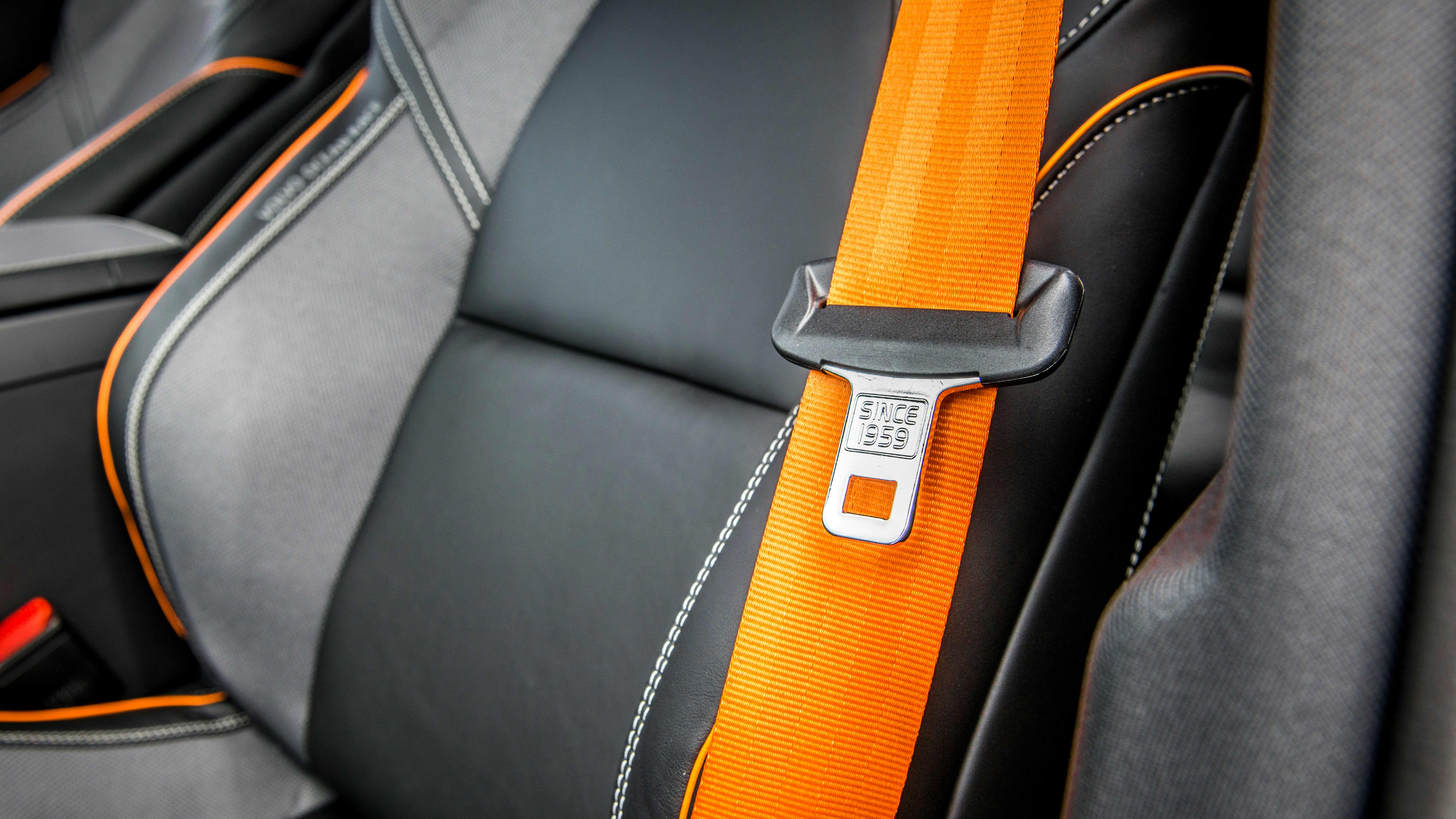 image of an orange seatbelt in a Volvo