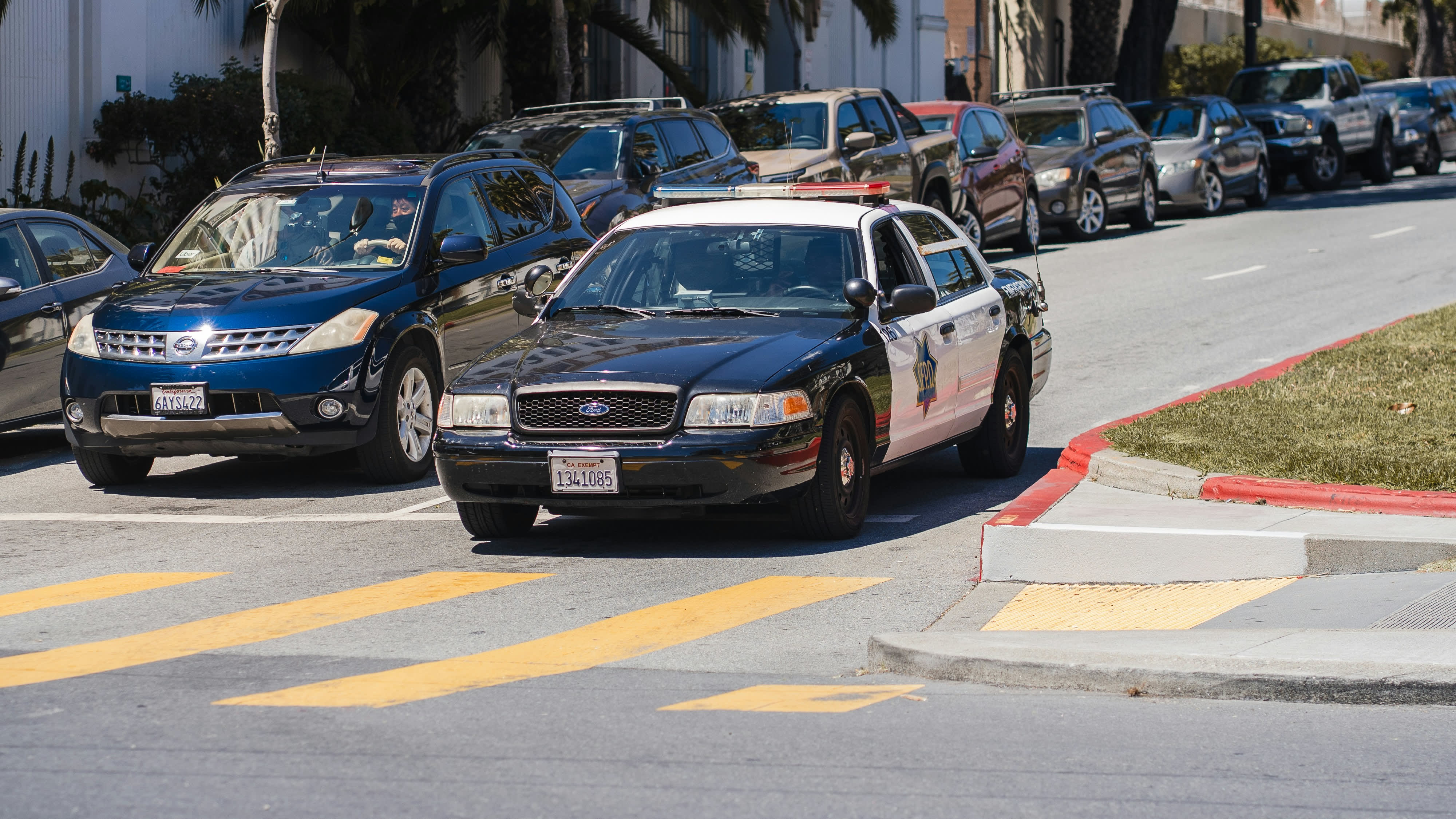 police car waiting at intersection