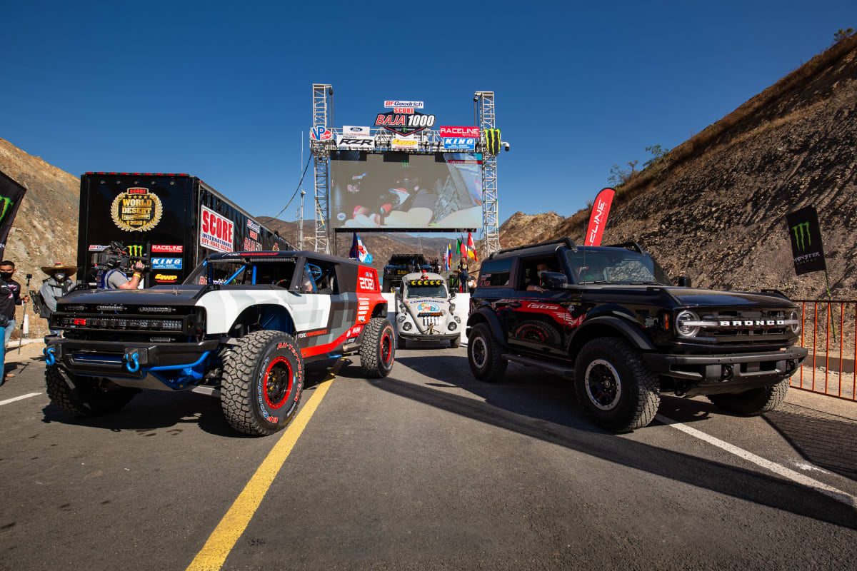 The Ford Bronco R race prototype and a 2021 Bronco Outer Banks™ two-door preproduction support vehicle.