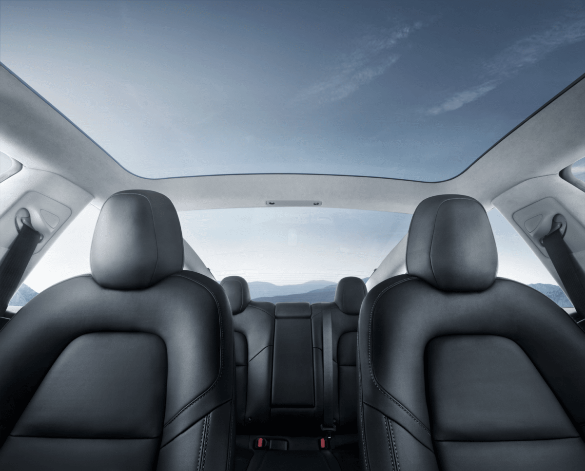 Every version of the Tesla Model 3 comes with the overhead glass roof (Timothy Artman)