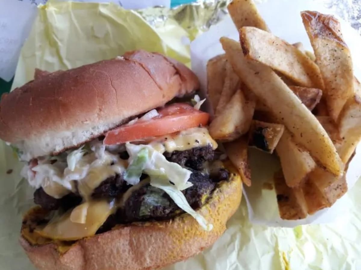 Double Cheeseburger with a side order of fries, from Fresh & Meaty Burgers.