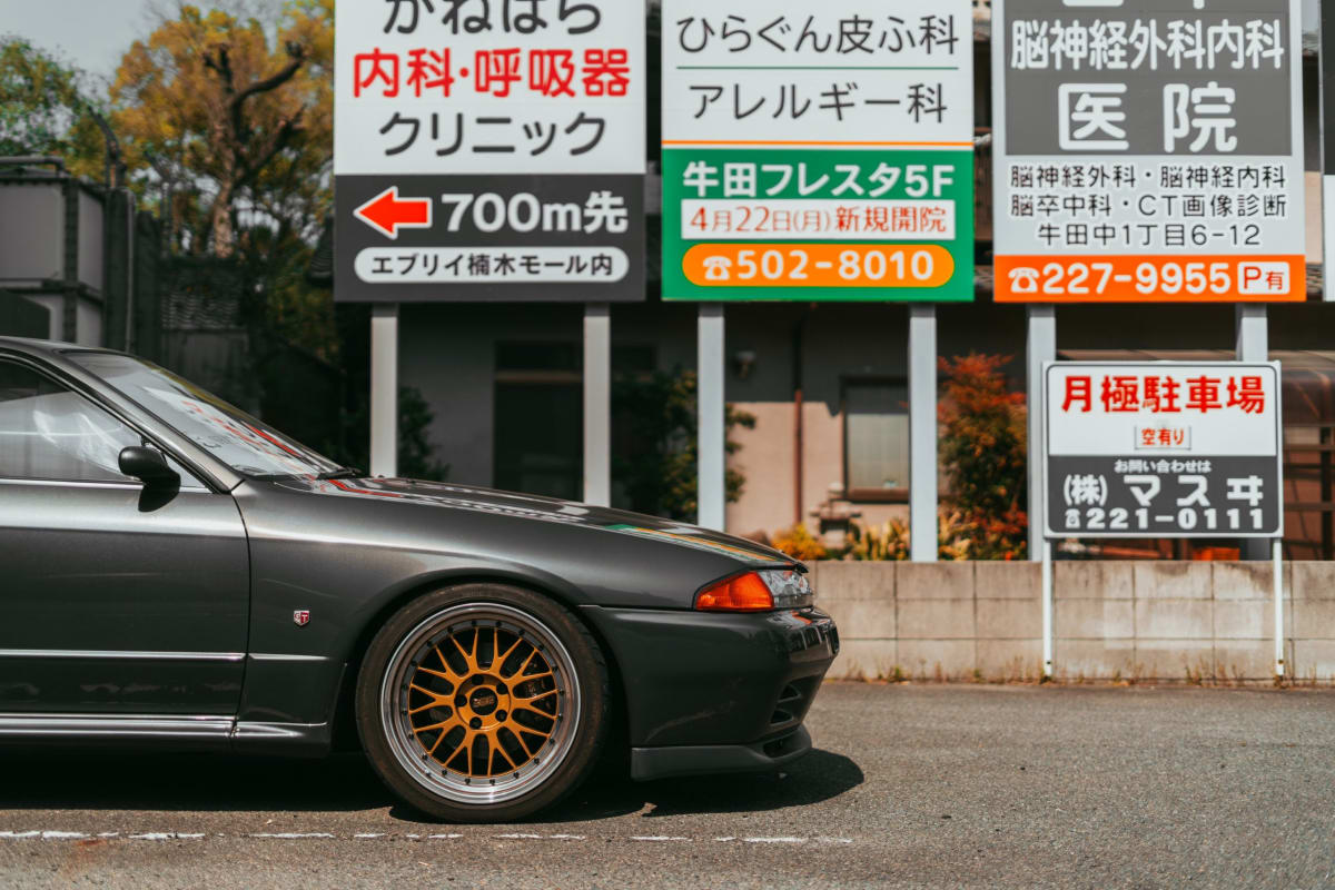 front of a car on road in Japan