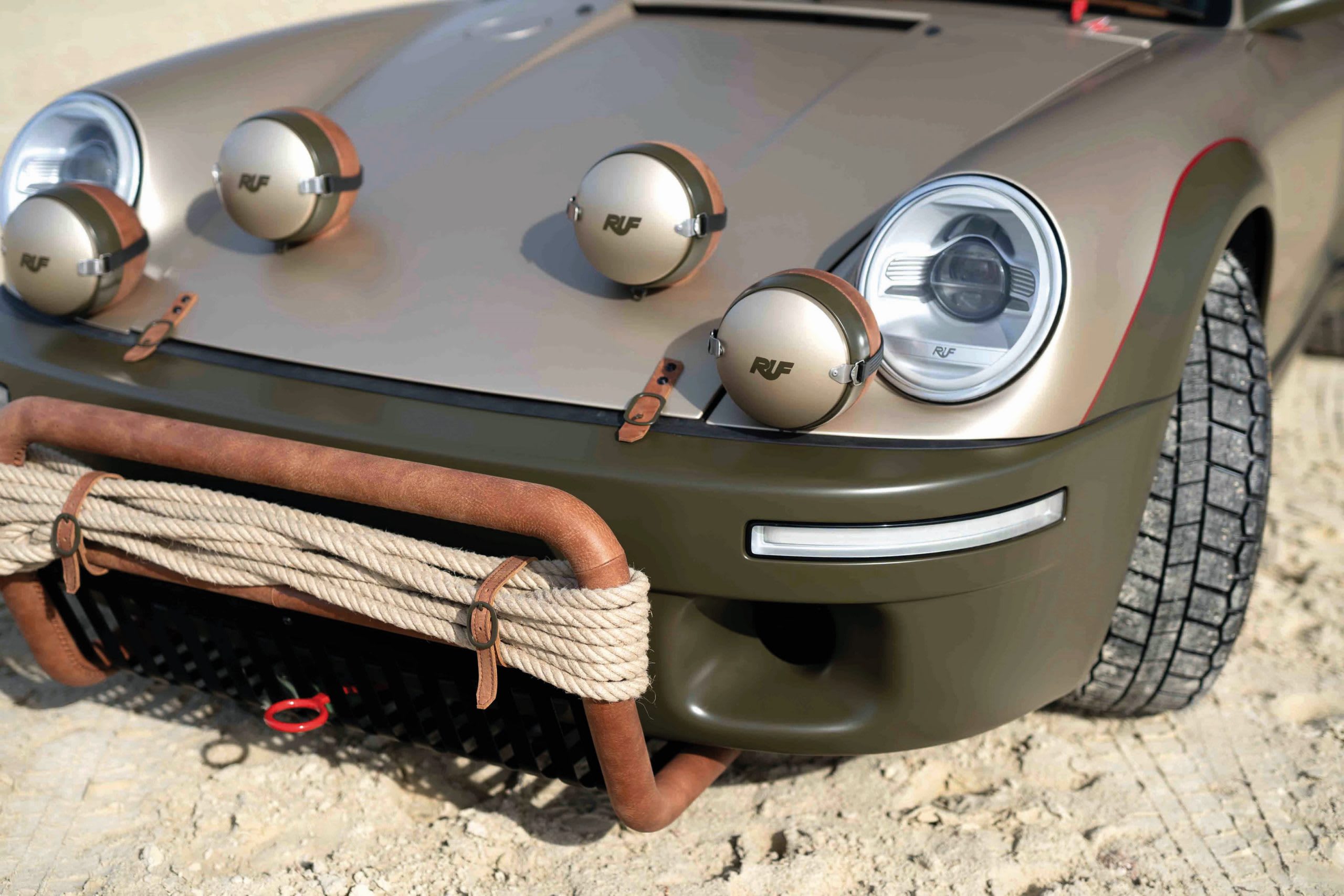 front of a RUF Rodeo Concept with extra lights and off-road details.