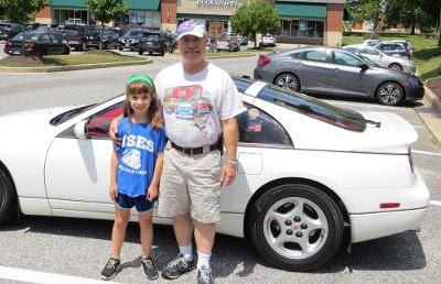 Dan and his daughter Anna with their 300ZX that was the inspiration for the supercomputers article.
