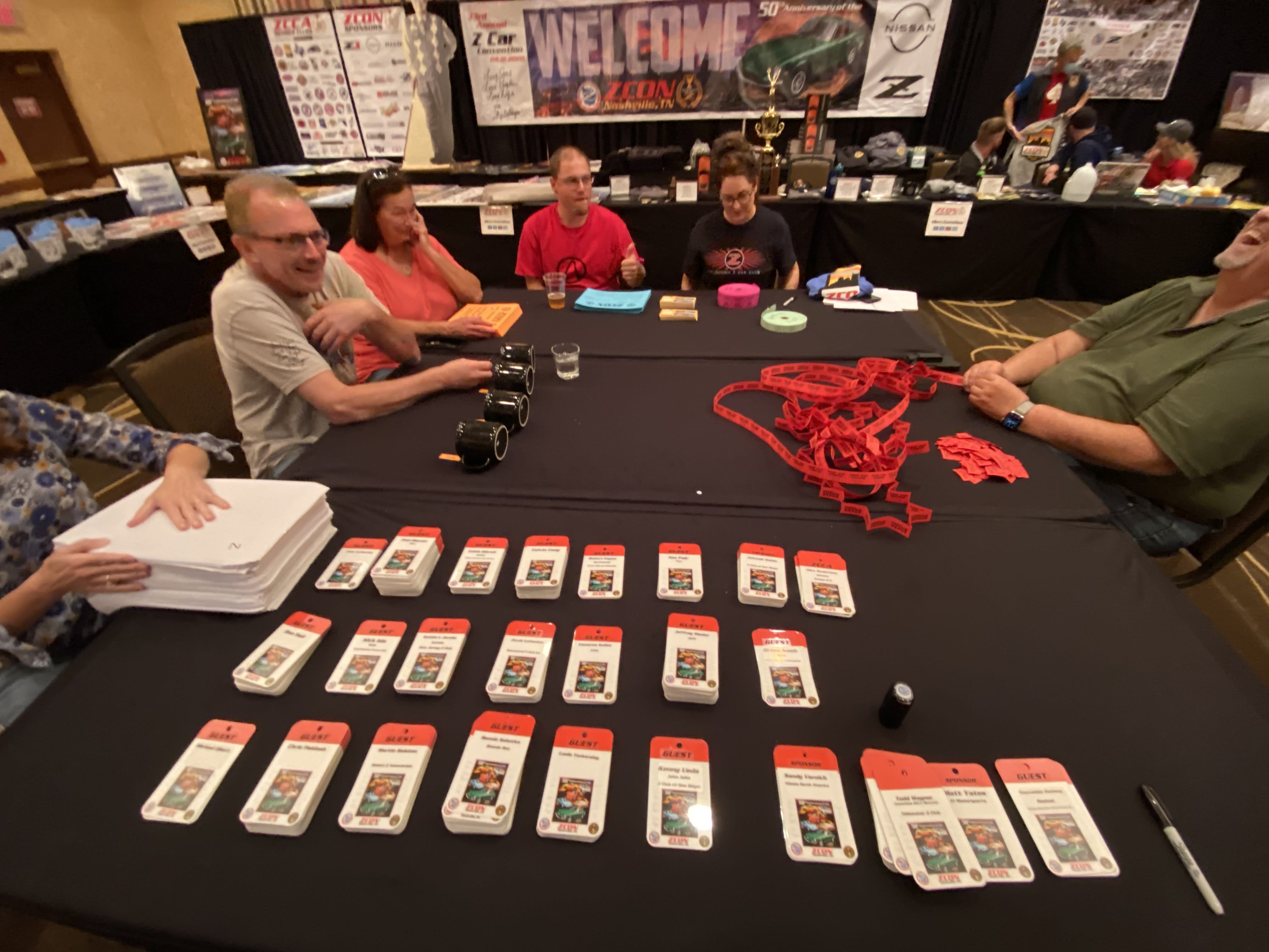 Unsung heroes. The attendees check-in table. An army of volunteers work behind the proverbial curtains to make these events possible. A round of applause, please.