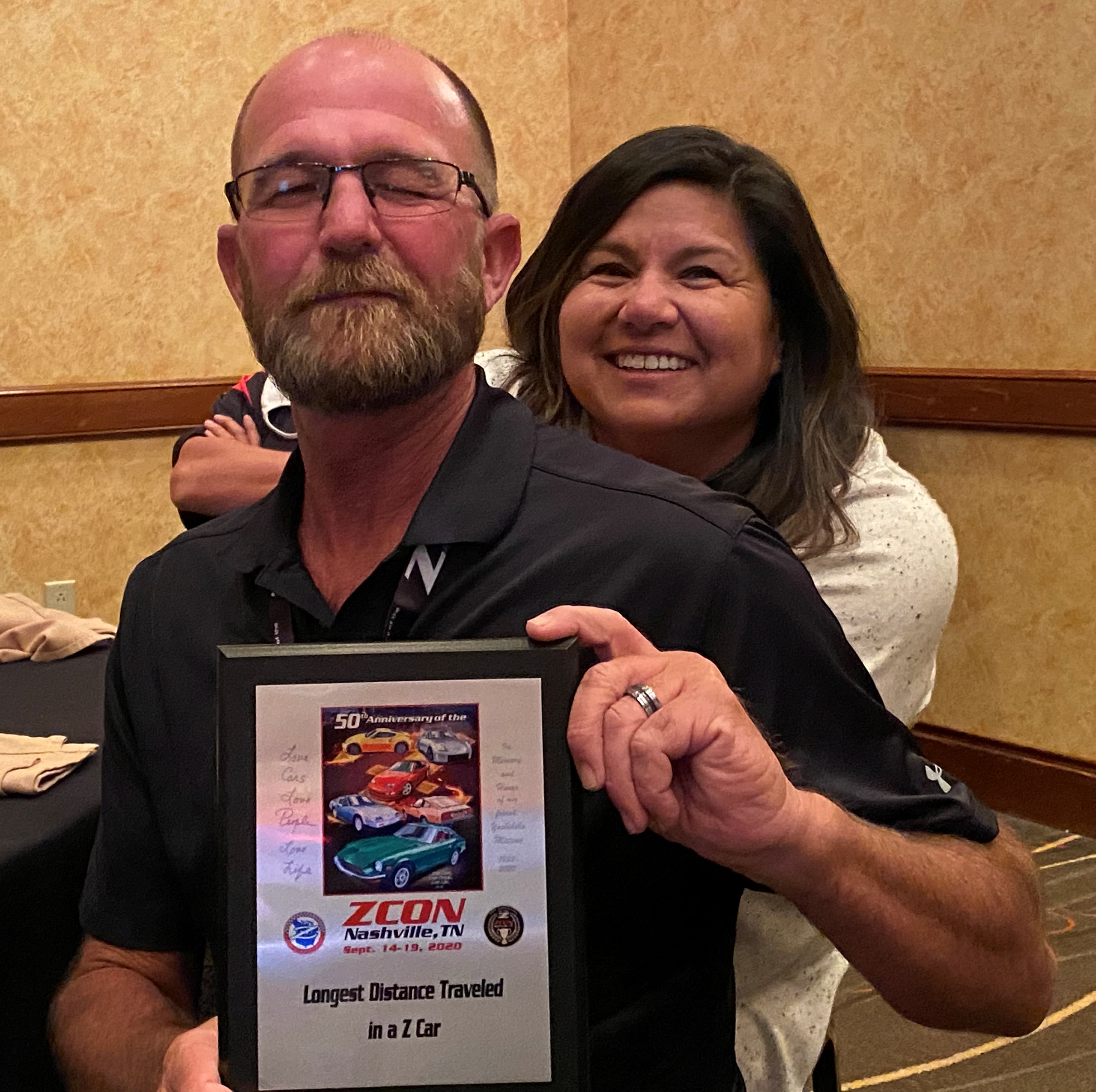 David and Angie Bailey with their trophy for Longest Distance Traveled in a Z to the Show- over 2400 miles from Southern California. Congratulations!