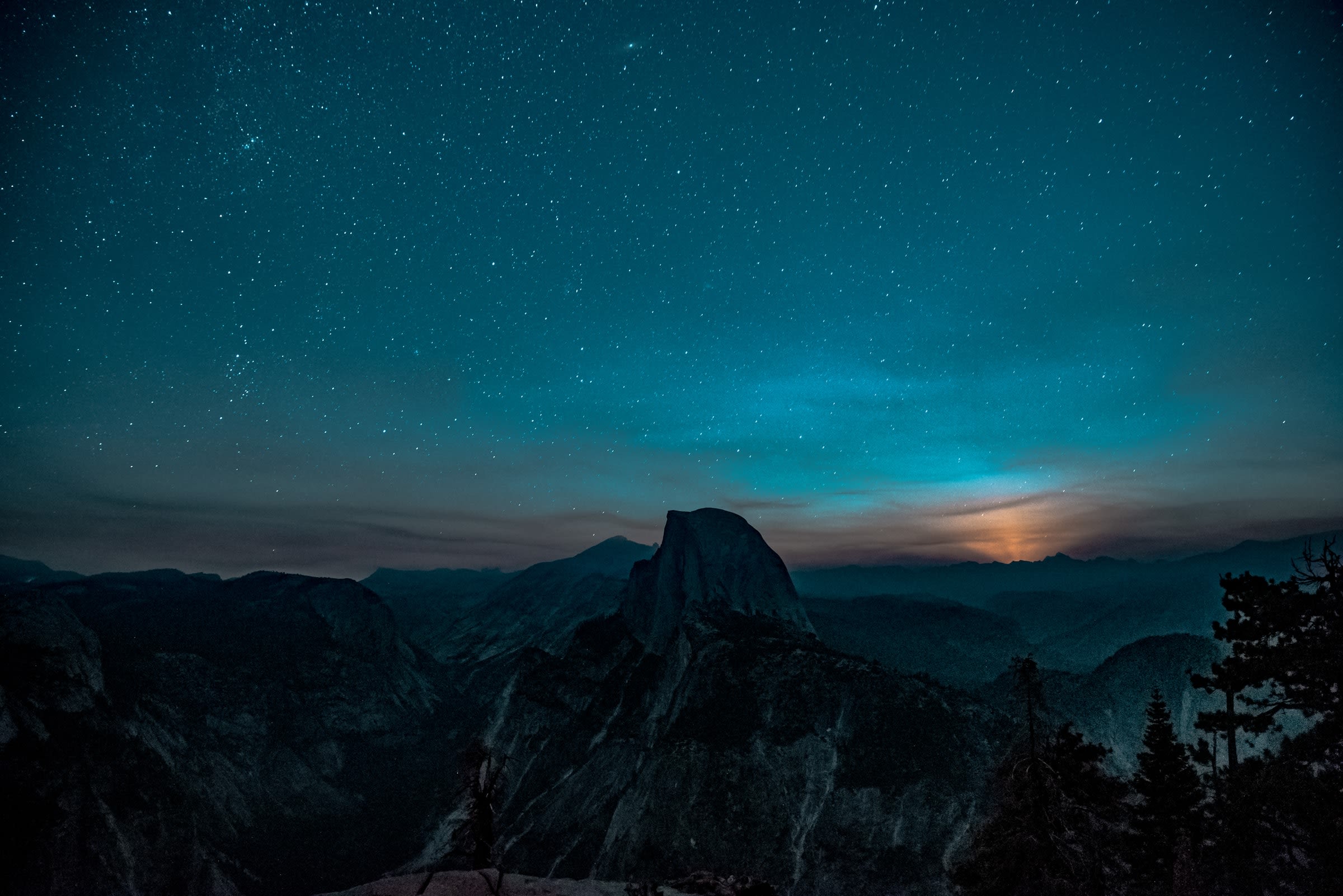 Yosemite National Park. The sun has set behind half-dome and the stars are out in their impressive array.