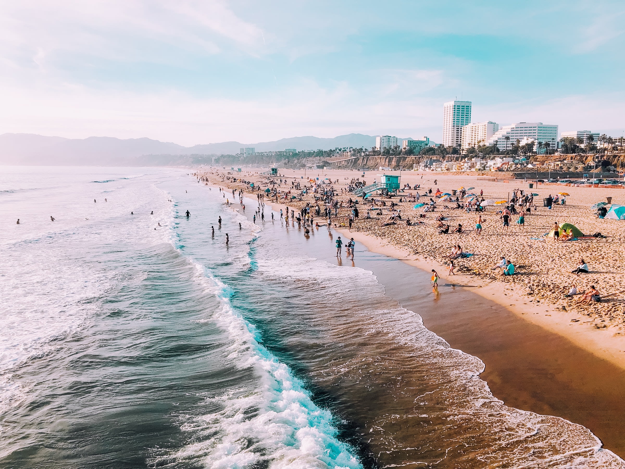 Santa Monica Beach with lots of families playing on the family friendly beach.