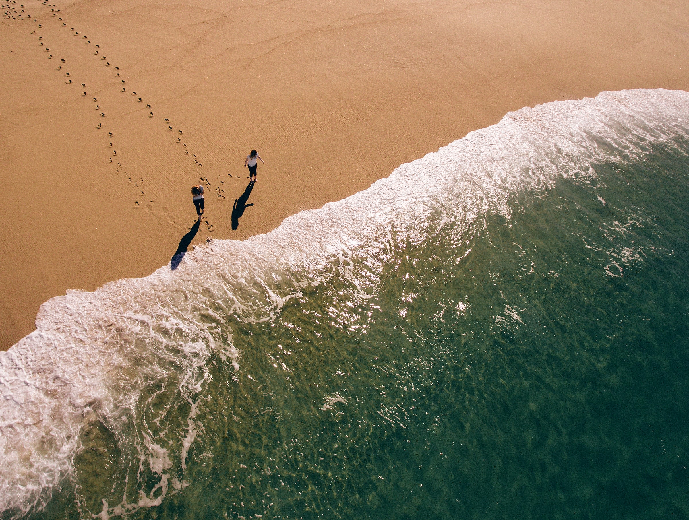two people enjoying the family friendly beach in Southern California