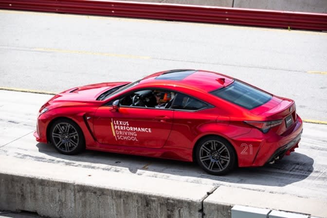 lexus-driving-school-red-lecus-on-track