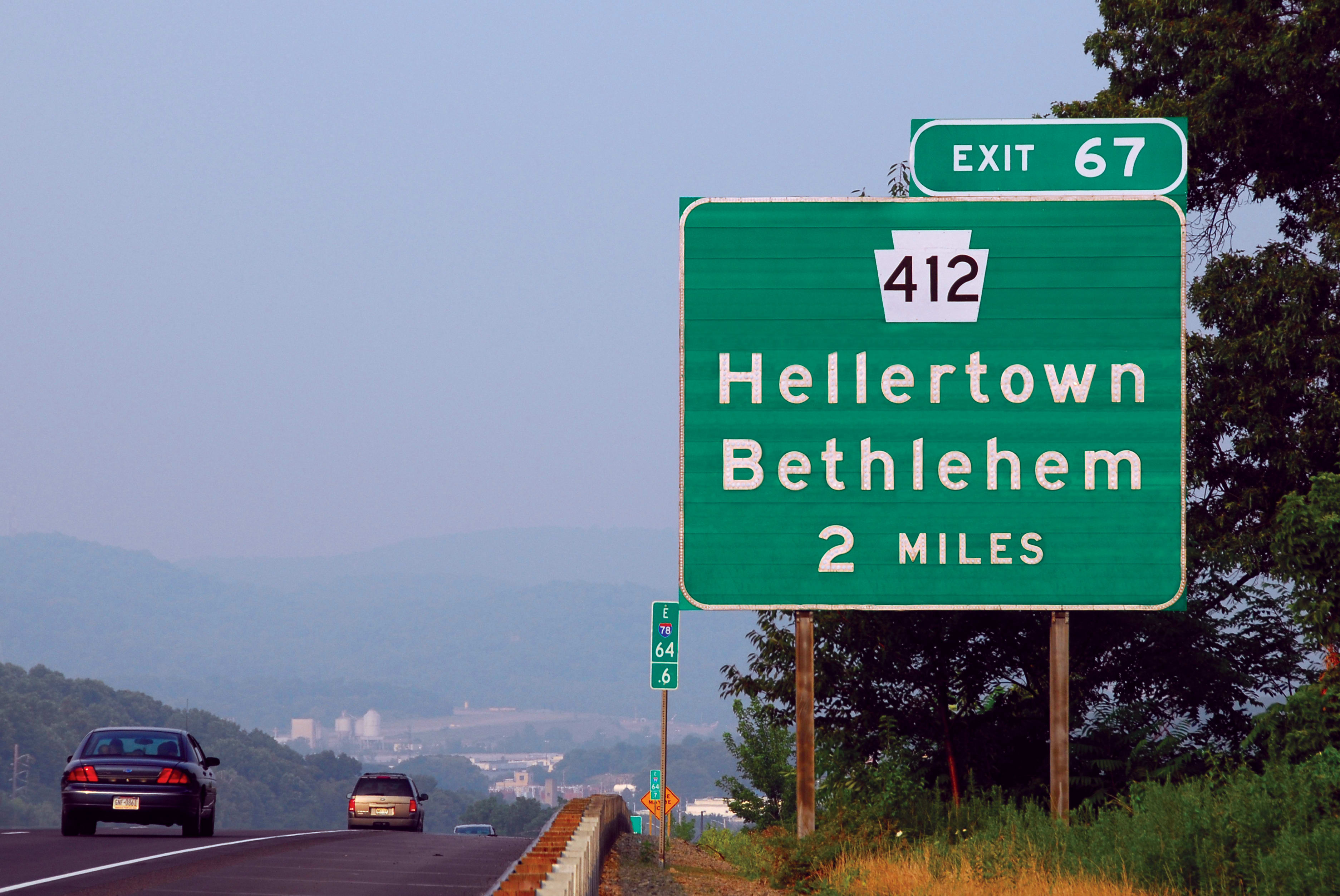 highway sign for the Hellertown exit off the 412 highway, with "Highway Gothic" font.