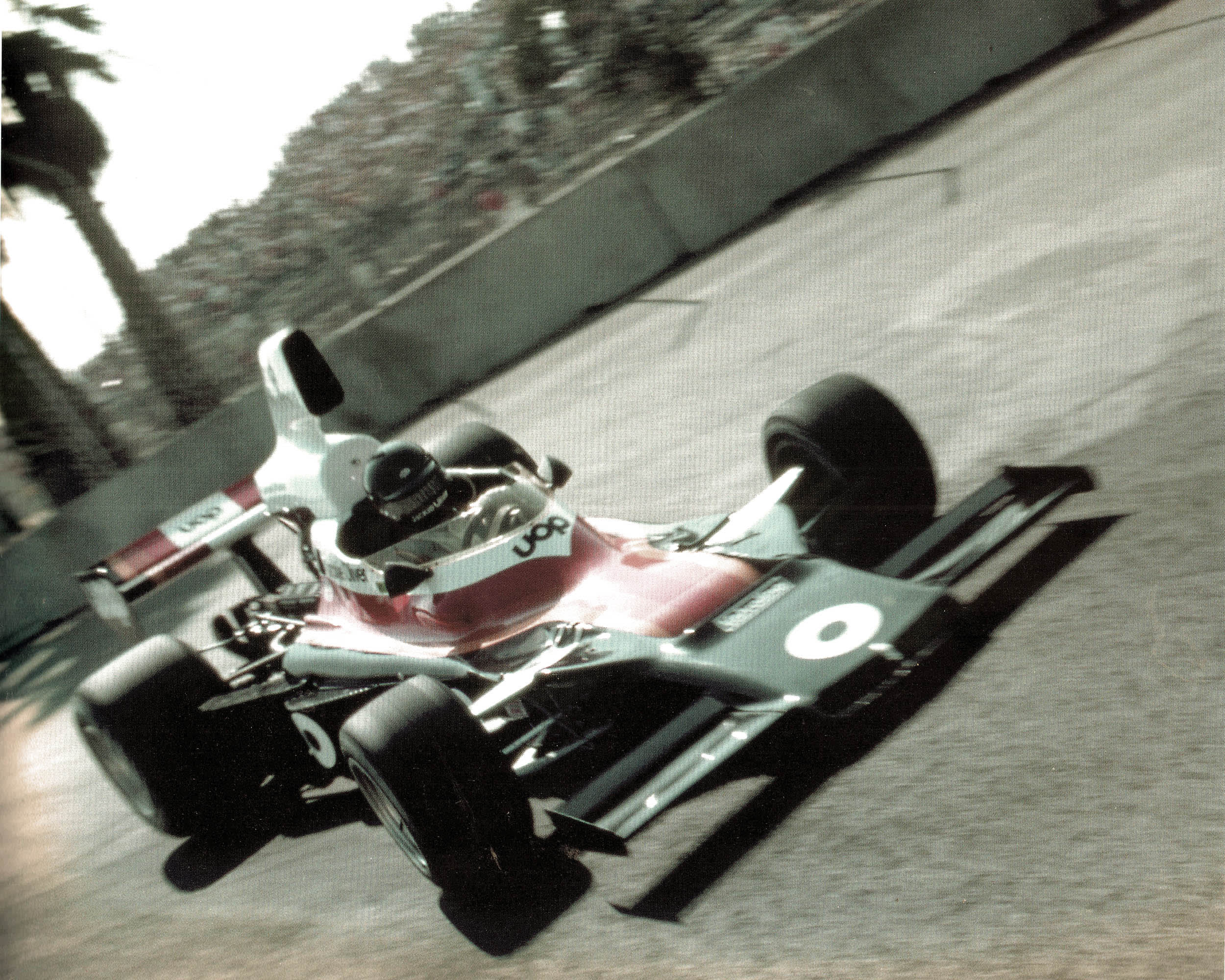 formula 5000 race car taking a corner during a race.