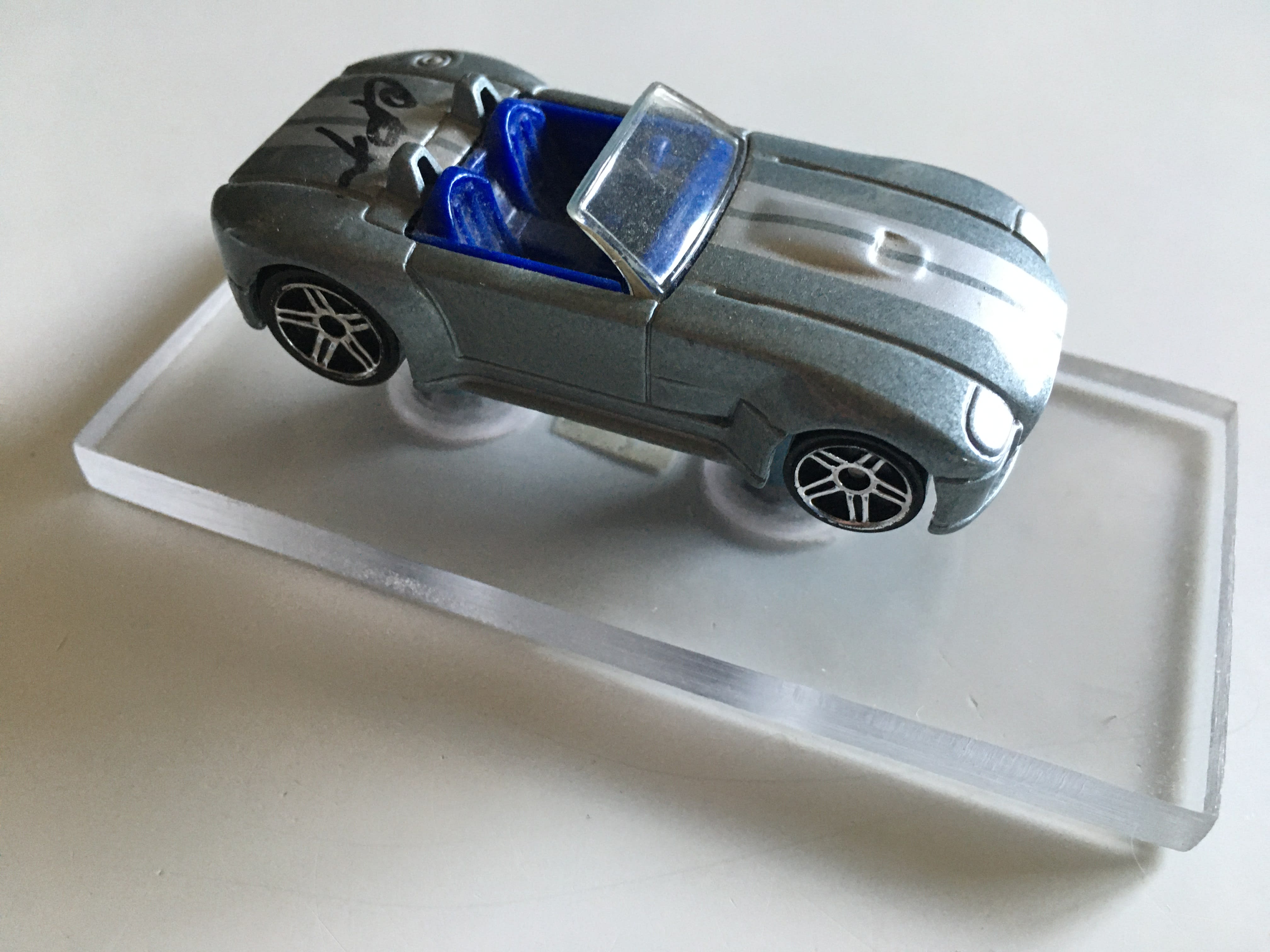 miniature Shelby Cobra standing on Doug Stoke's desk