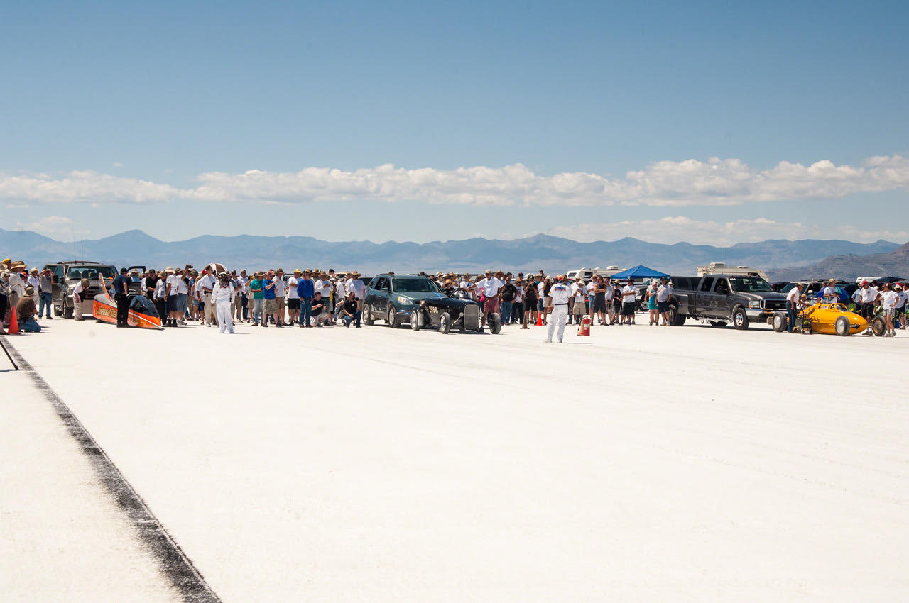 huge group of race enthusiasts gathered on the salt flats of Bonneville.