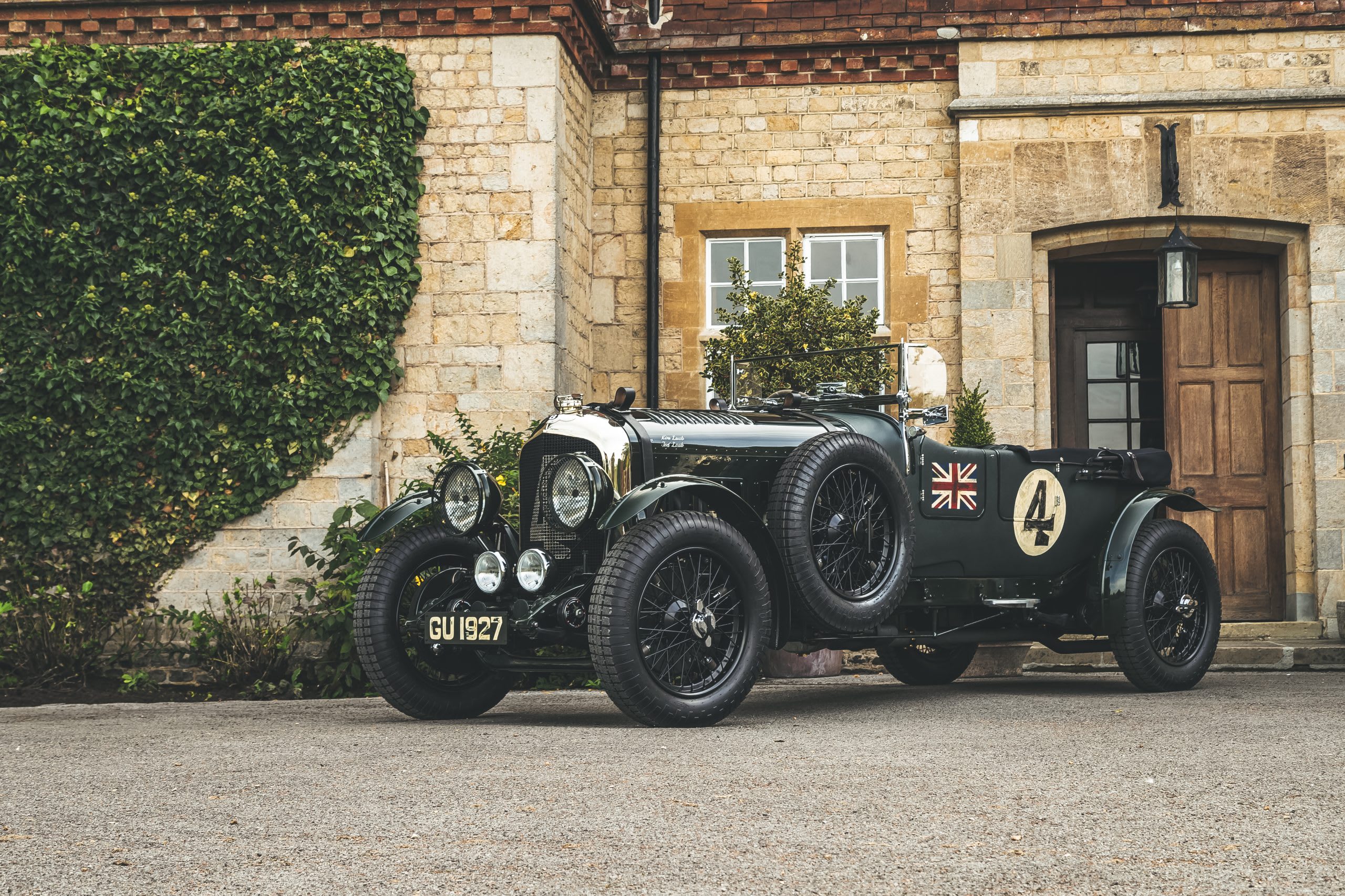 a dark green Bentley from 1929 parked outside the castle at the 2021 Salon Prive