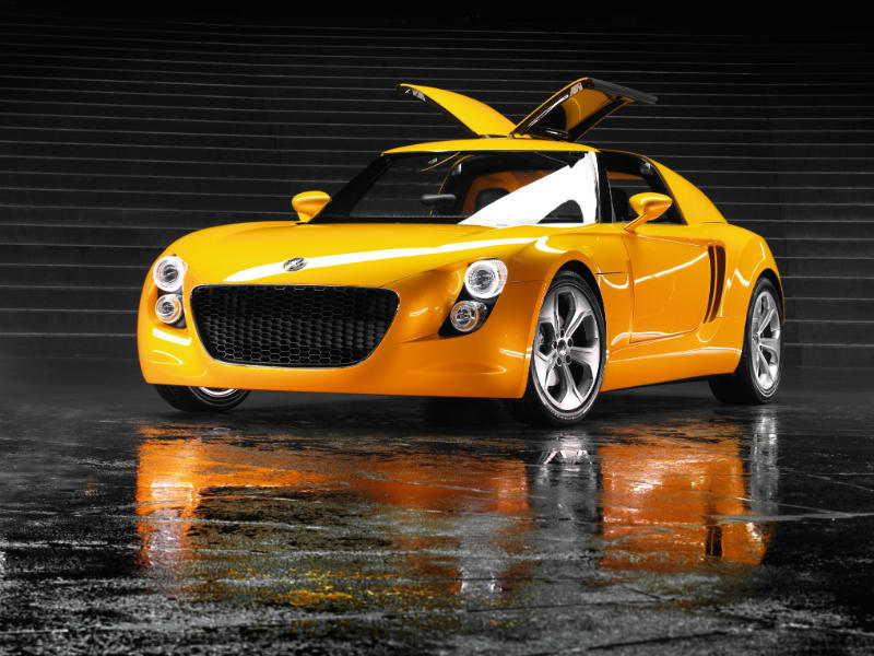 a 2005 VE Eco Racer, totally yellow in studio lighting.