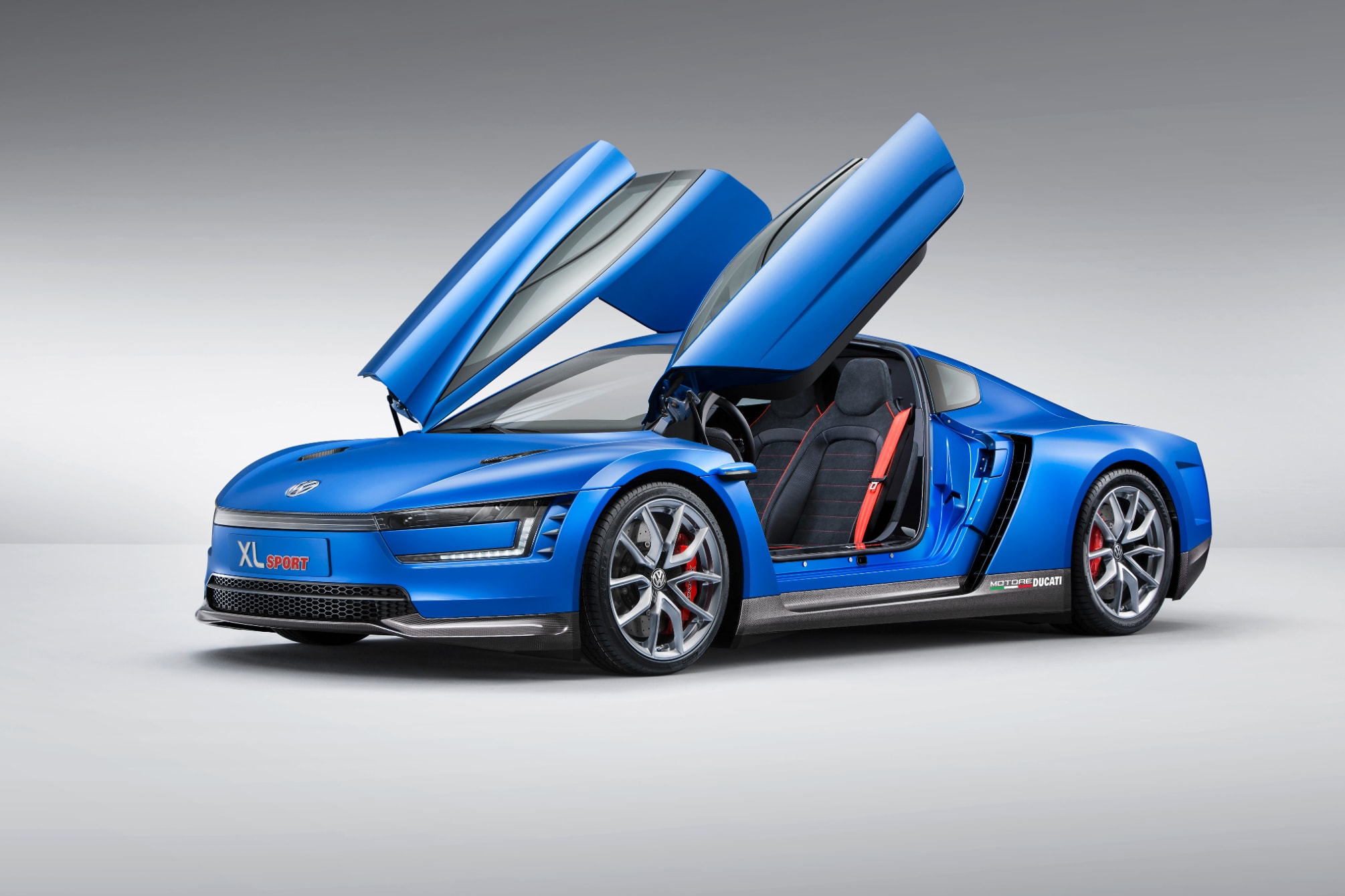a blue 2004 VW XL Sport in a photo-studio