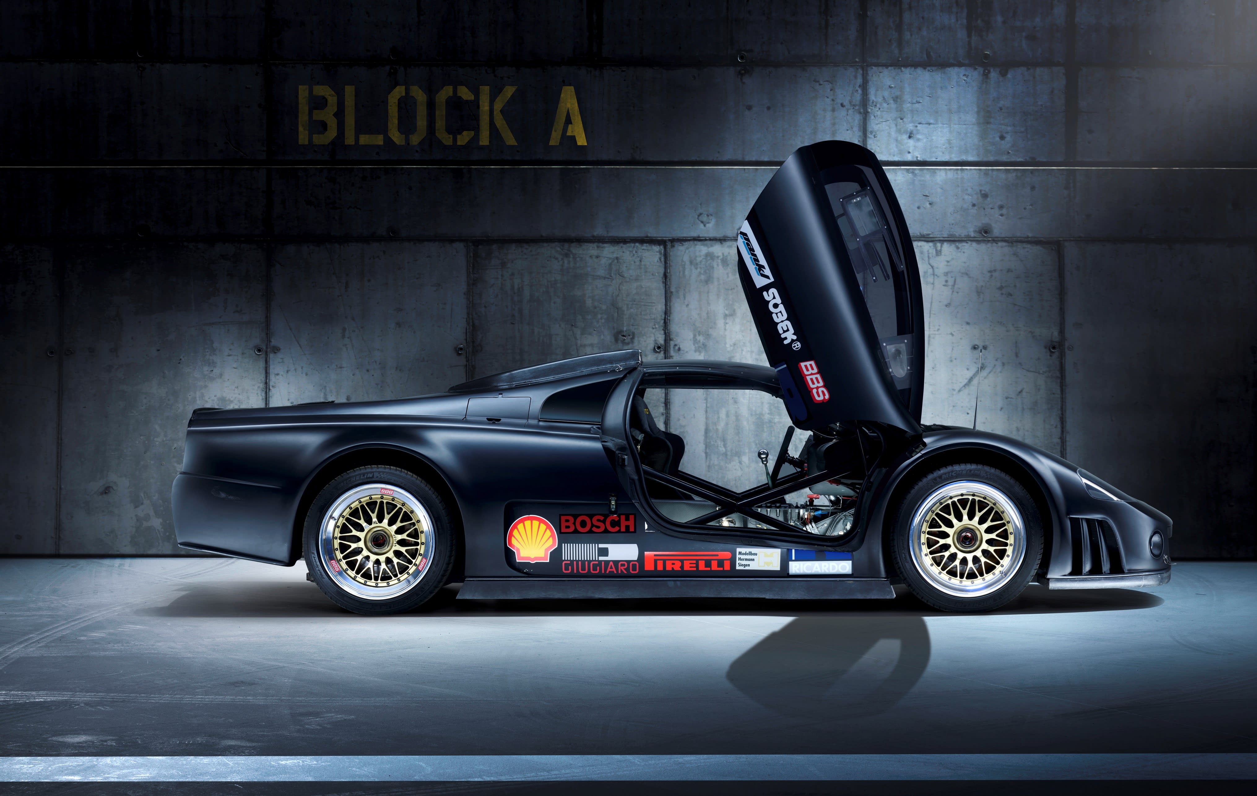 a black VW W12 Nardo with racing decals.