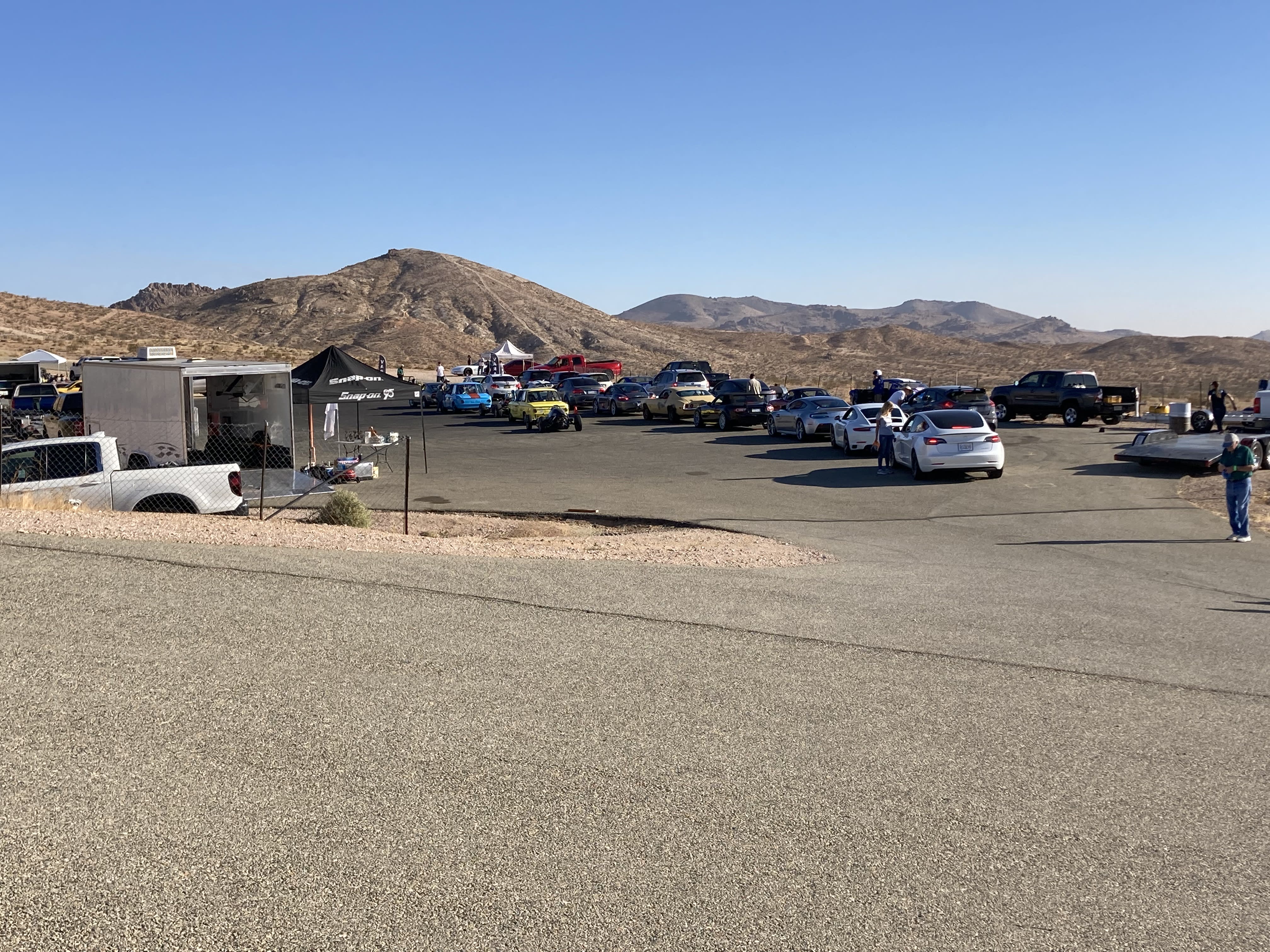 lots of cars lined up at Willow Springs, ready to race up the hill.